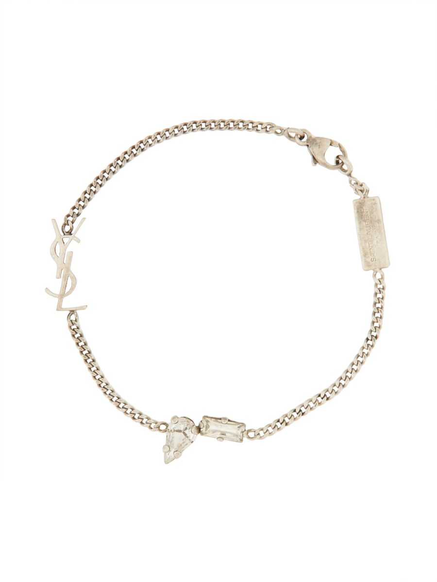 SAINT LAURENT BRACCIALE CON CHARM CASSANDRE IN METALLO E STRASS