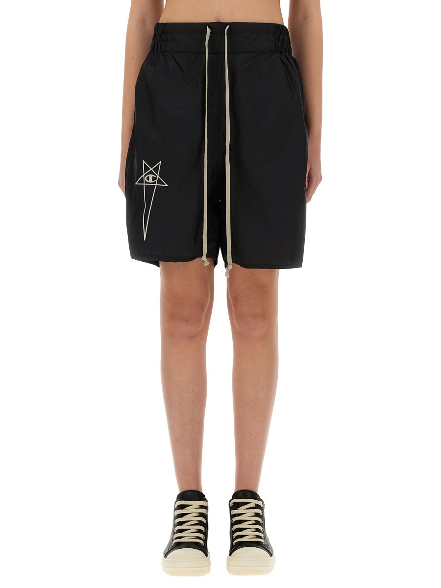 SHORTS CON LOGO