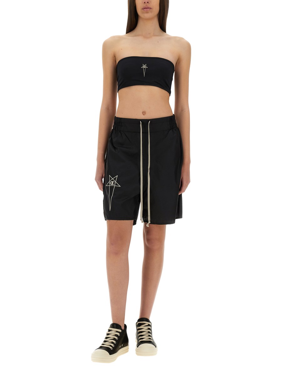 SHORTS CON LOGO
