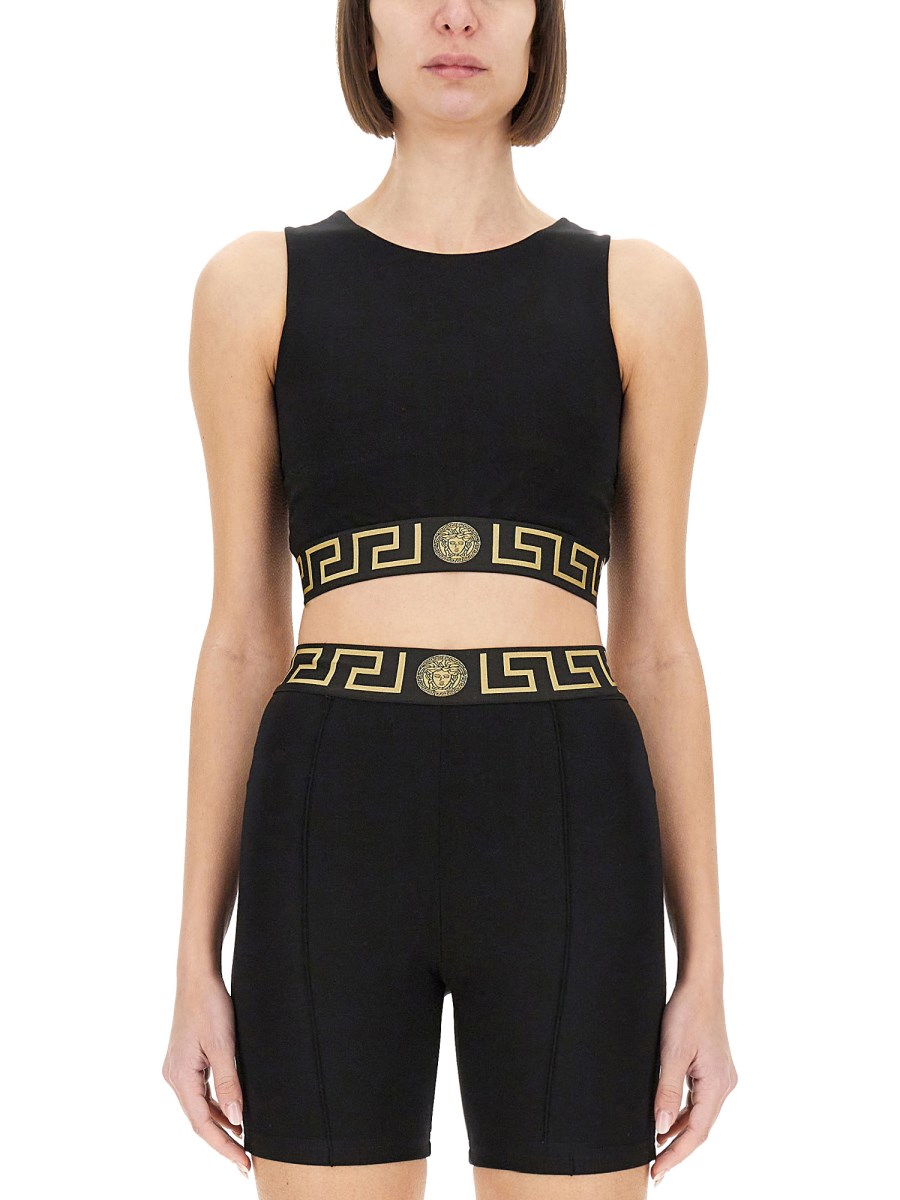 CROP TOP CON BORDO GRECA