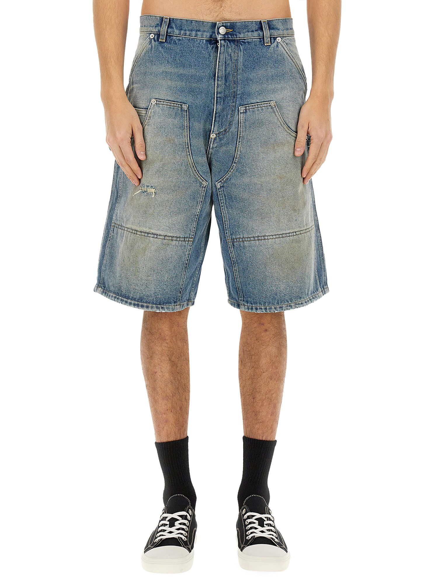 Moschino Distressed Denim Shorts In Denim