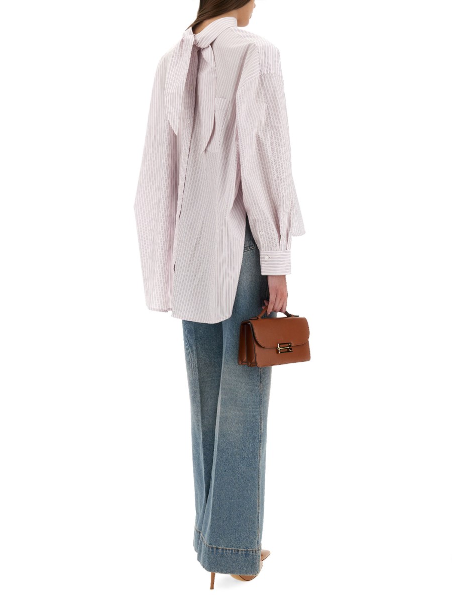 BLUSA CON COLLETTO ANNODABILE