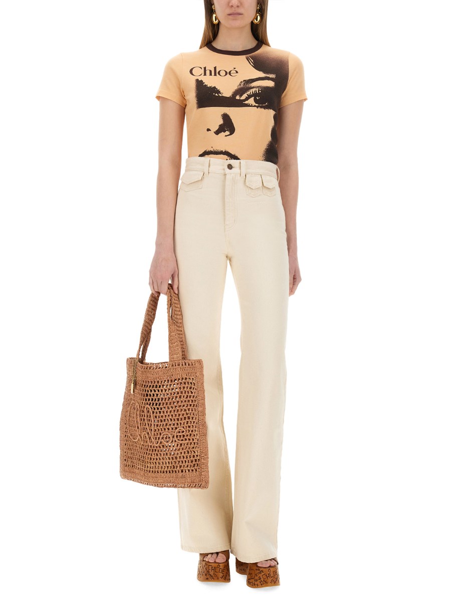 JEANS FLARE A VITA ALTA