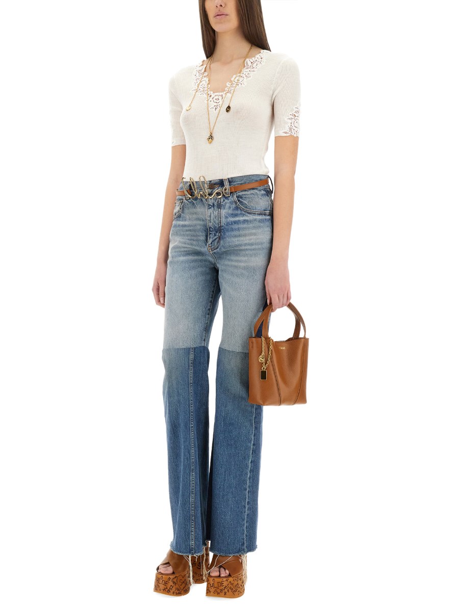 TOP CON SCOLLO IN PIZZO