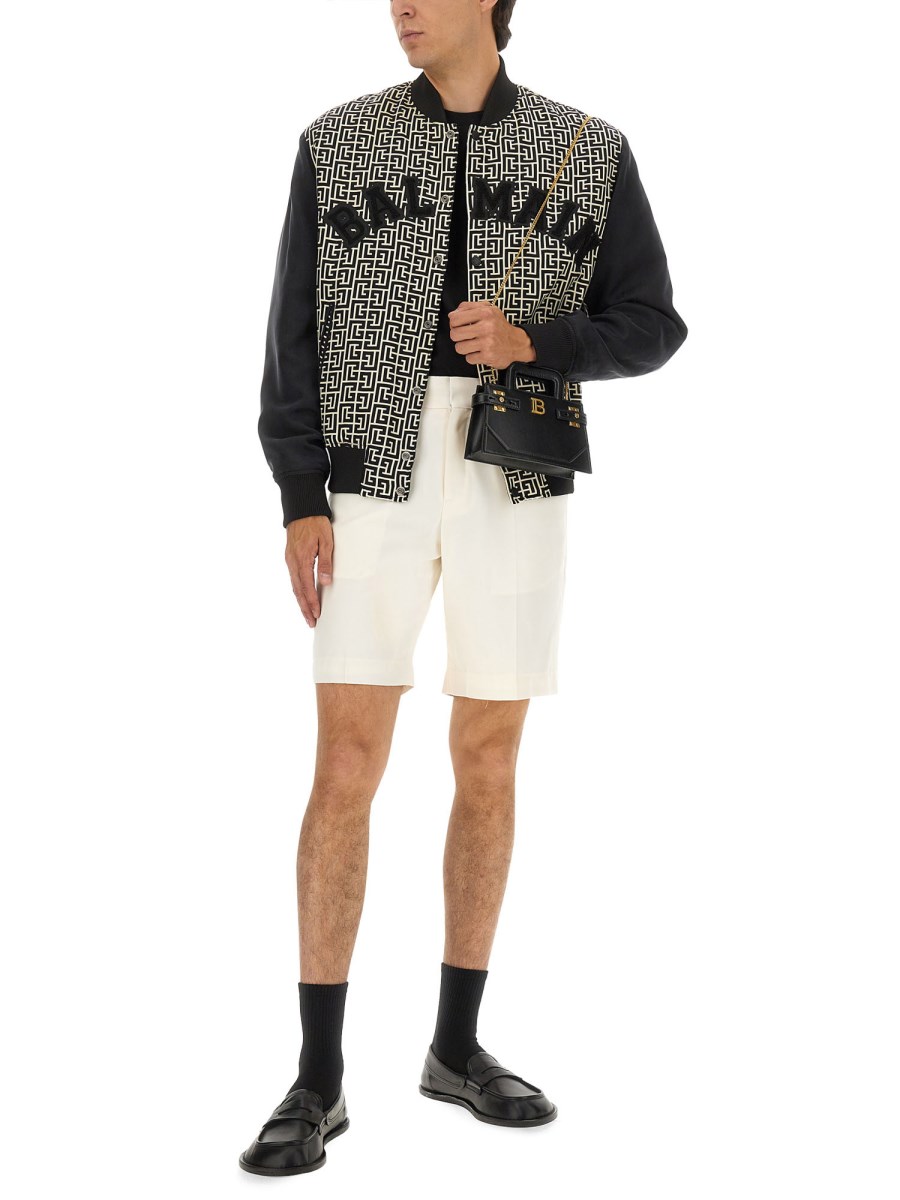 GIACCA VARSITY CON MONOGRAMMA E TOPPE