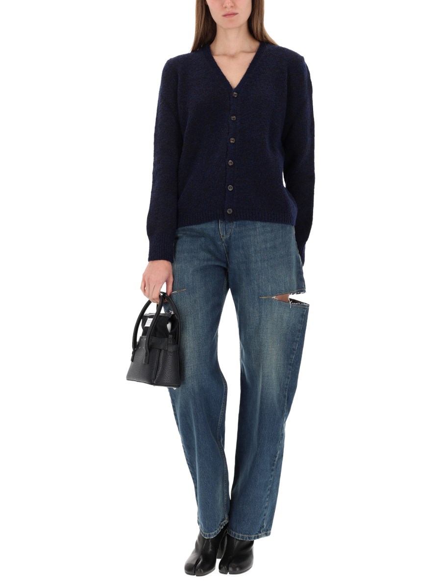 JEANS TAGLIATO CON ORLO SFRANGIATO