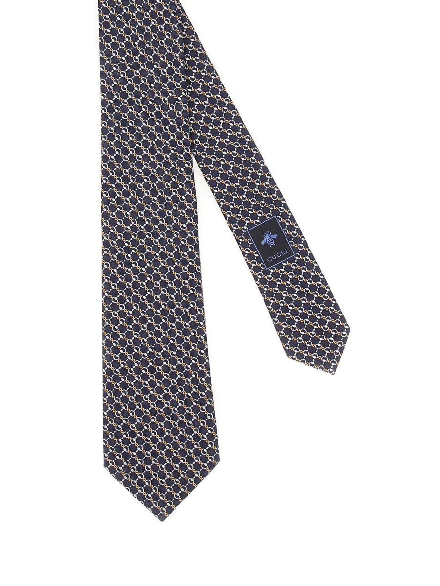 CRAVATTA IN SETA JACQUARD CON MORSETTO