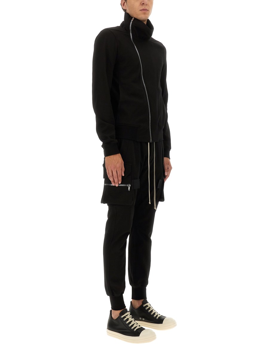 FELPA CON ZIP ASIMMETRICA