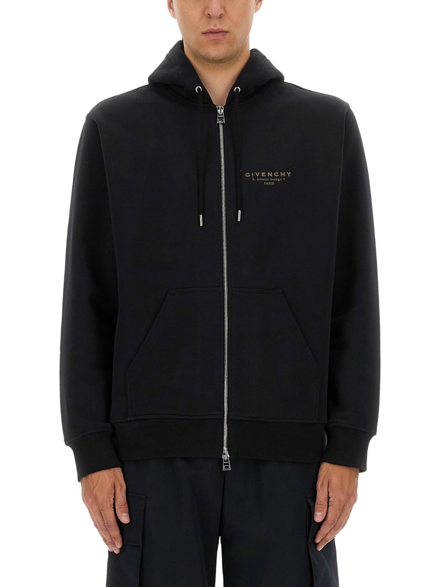 FELPA CON CAPPUCCIO E ZIP