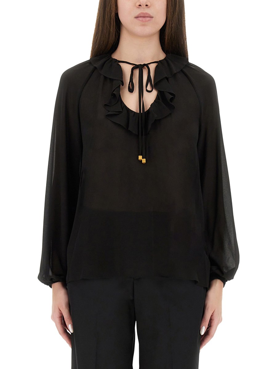 BLUSA CON VOLANT
