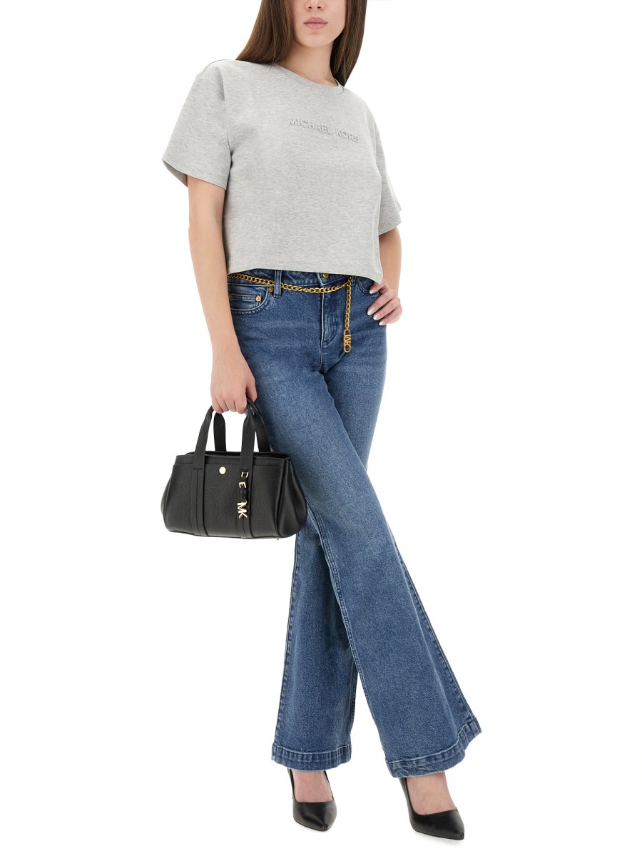 JEANS SVASATO CON CINTURA