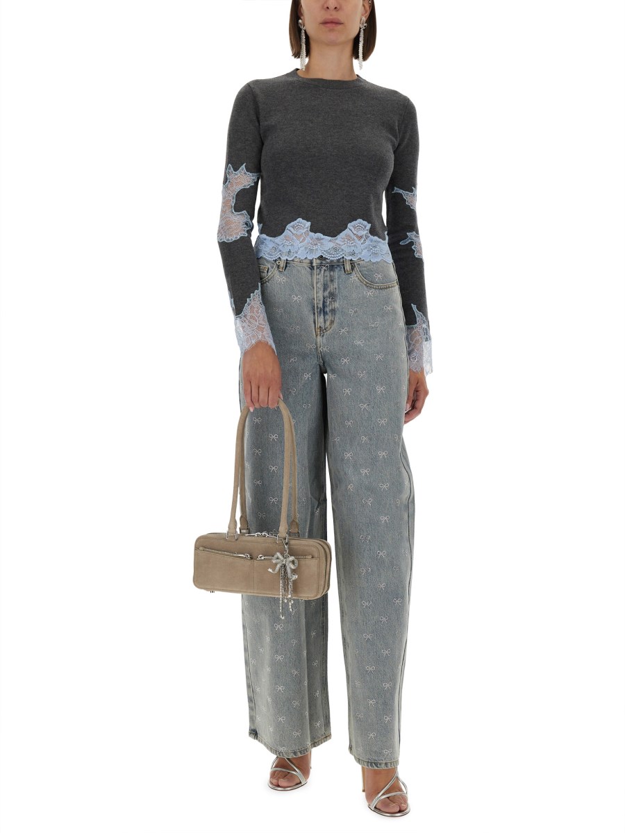 JEANS CON FIOCCHI STRASS