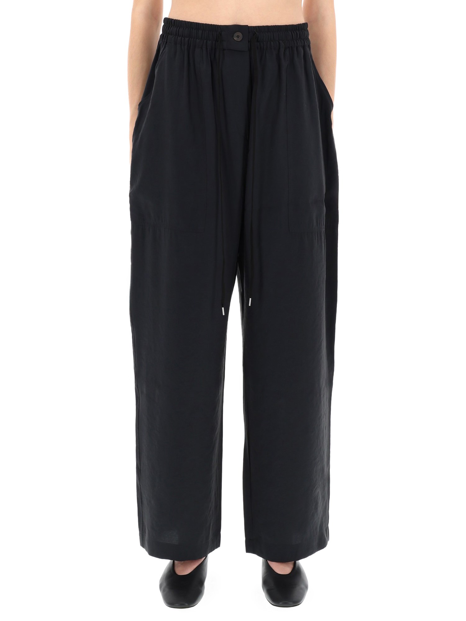 Studio Nicholson Comfortable Trousers Featuring Side Pockets In Blue