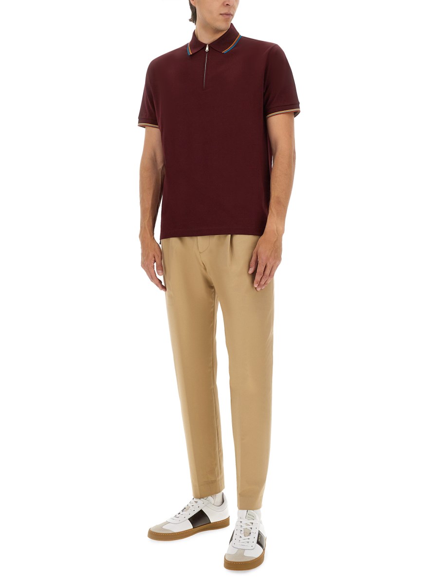 POLO CON ZIP