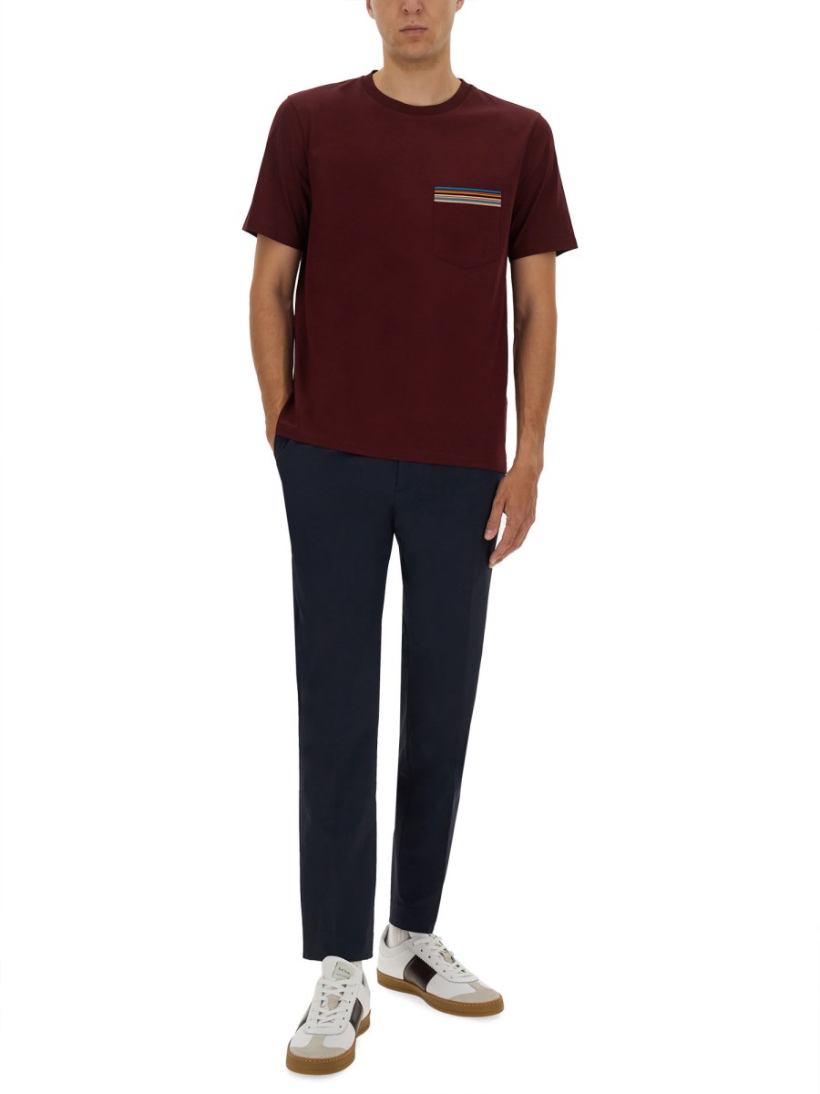 T-SHIRT CON TASCHINO A RIGHE