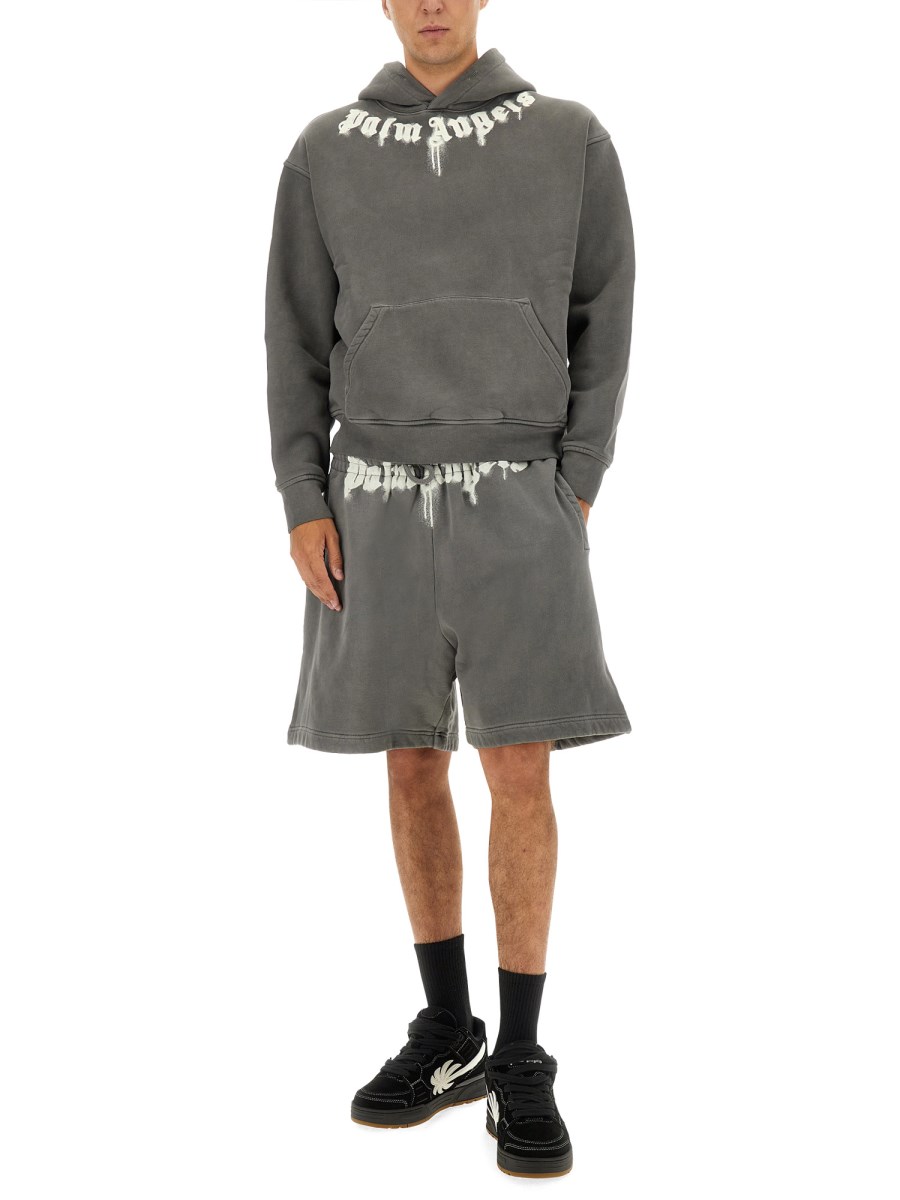 SHORTS CON LOGO