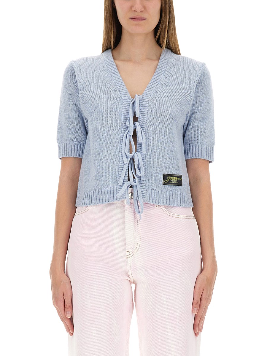 CARDIGAN CON FIOCCHI
