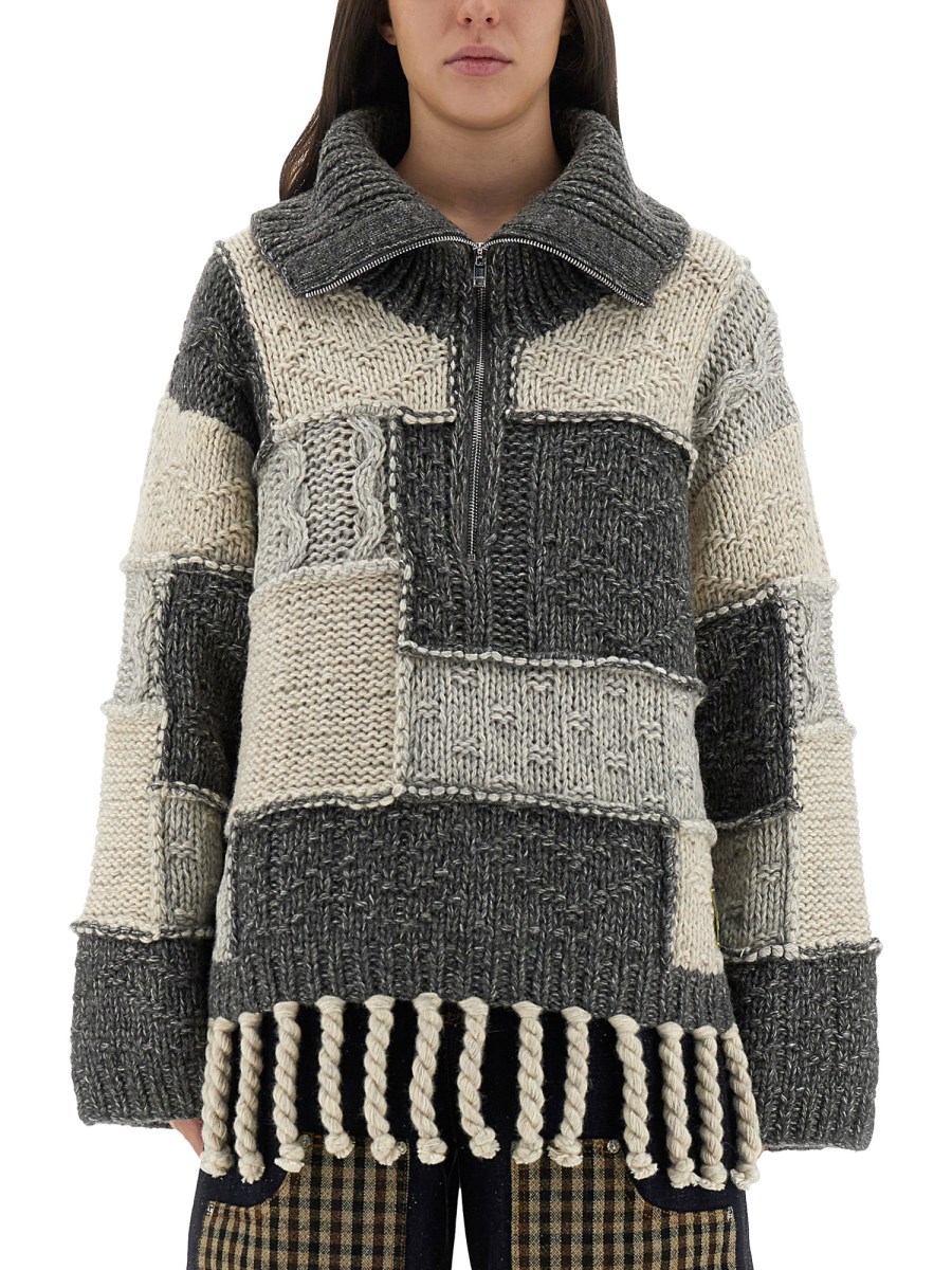 MAGLIA PATCHWORK CON FRANGE