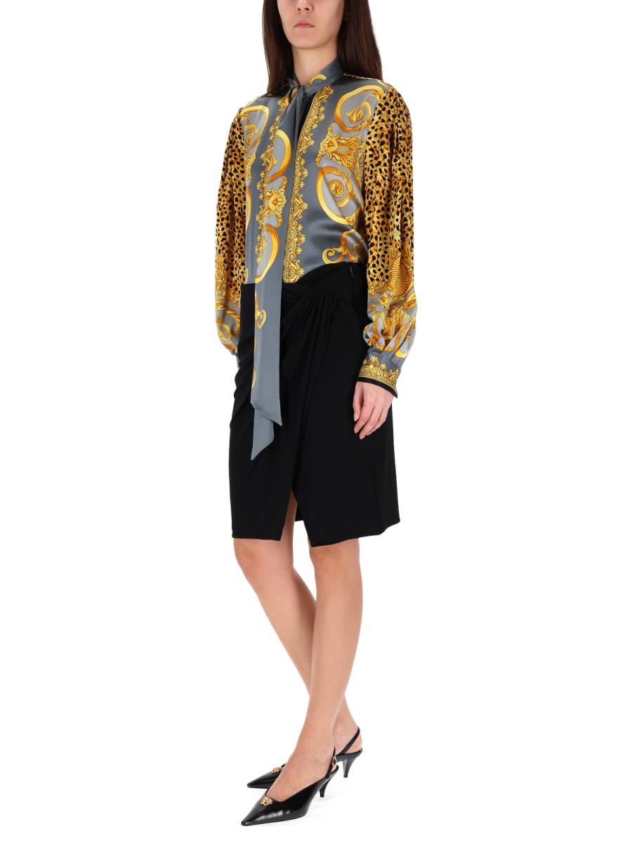 GONNA MIDI CON ORLO ASIMMETRICO