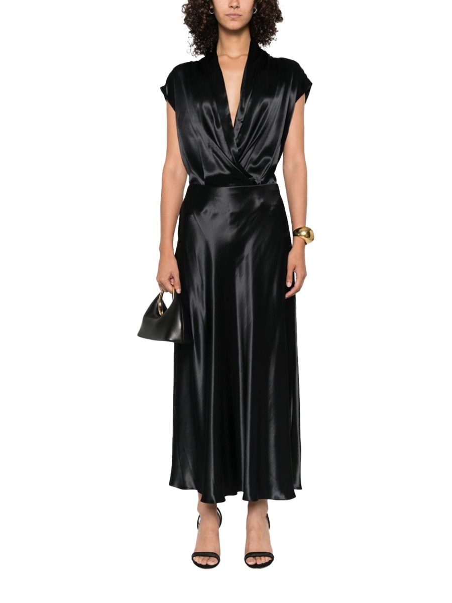 TOP SMANICATO CON SCOLLO