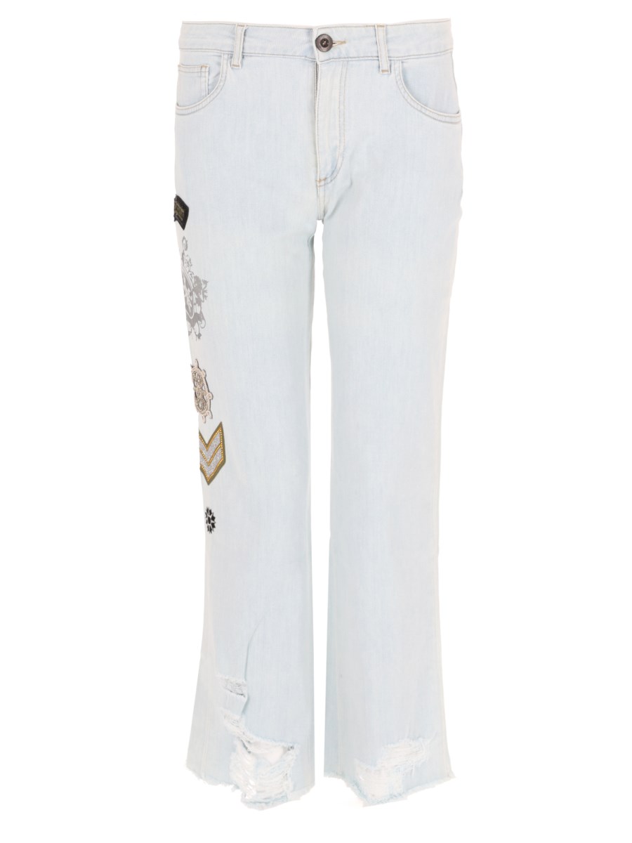 JEANS CON PATCH E STAMPA