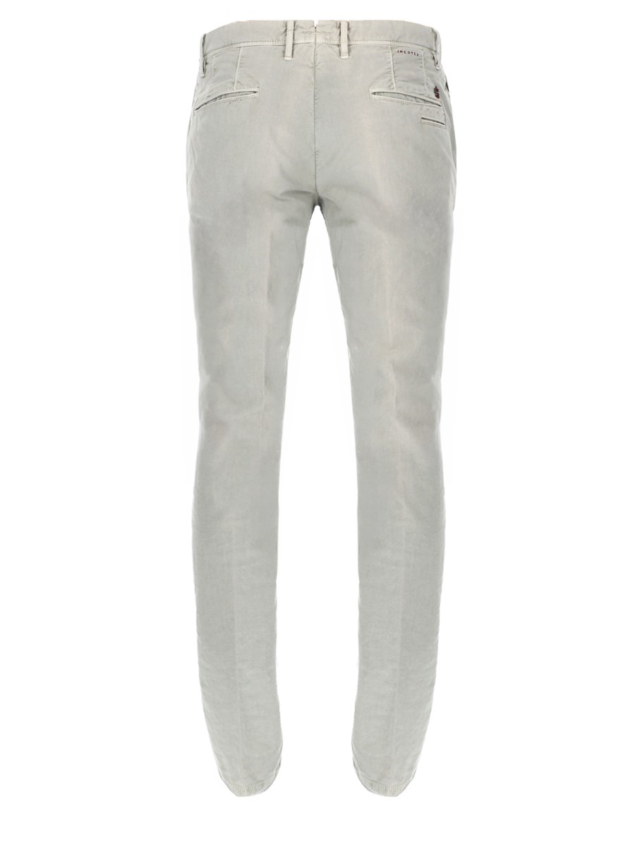 JEANS CON PATCH LOGO