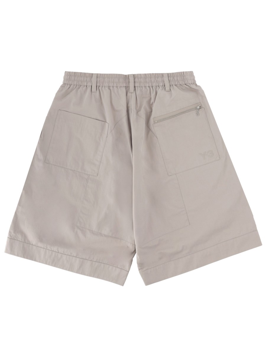 SHORTS CARGO A GAMBA LARGA