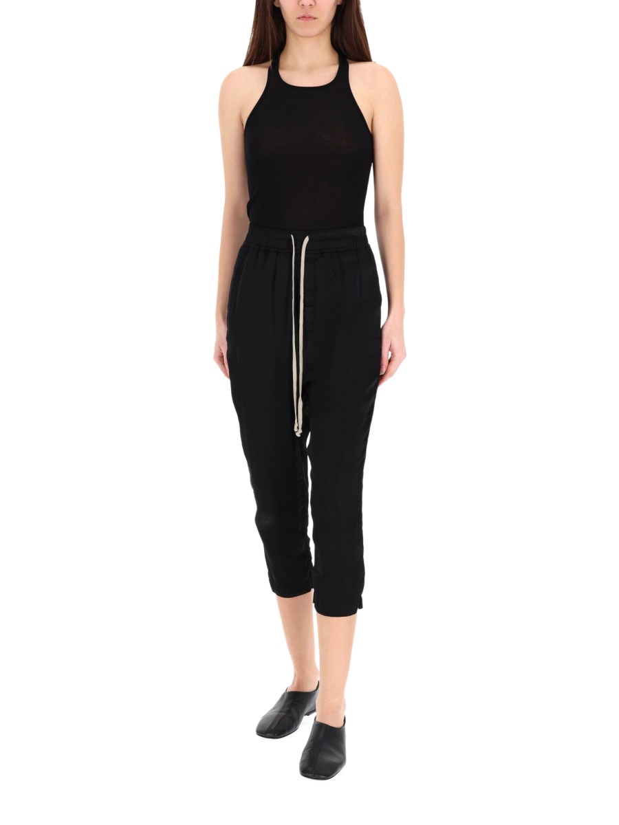 TOP SMANICATO IN COTONE