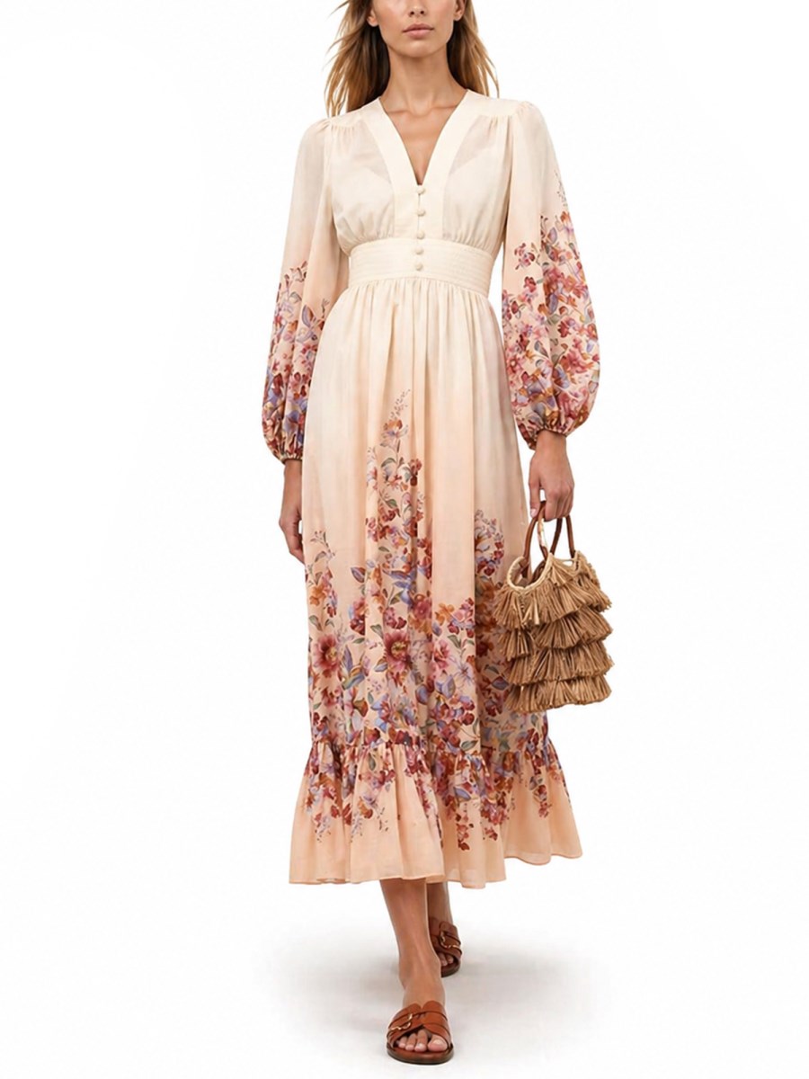 ABITO LUNGO CON SCOLLO A V