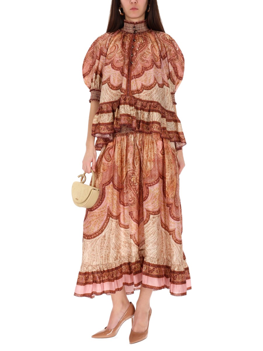 BLUSA CON VOLANT WANDERLUST