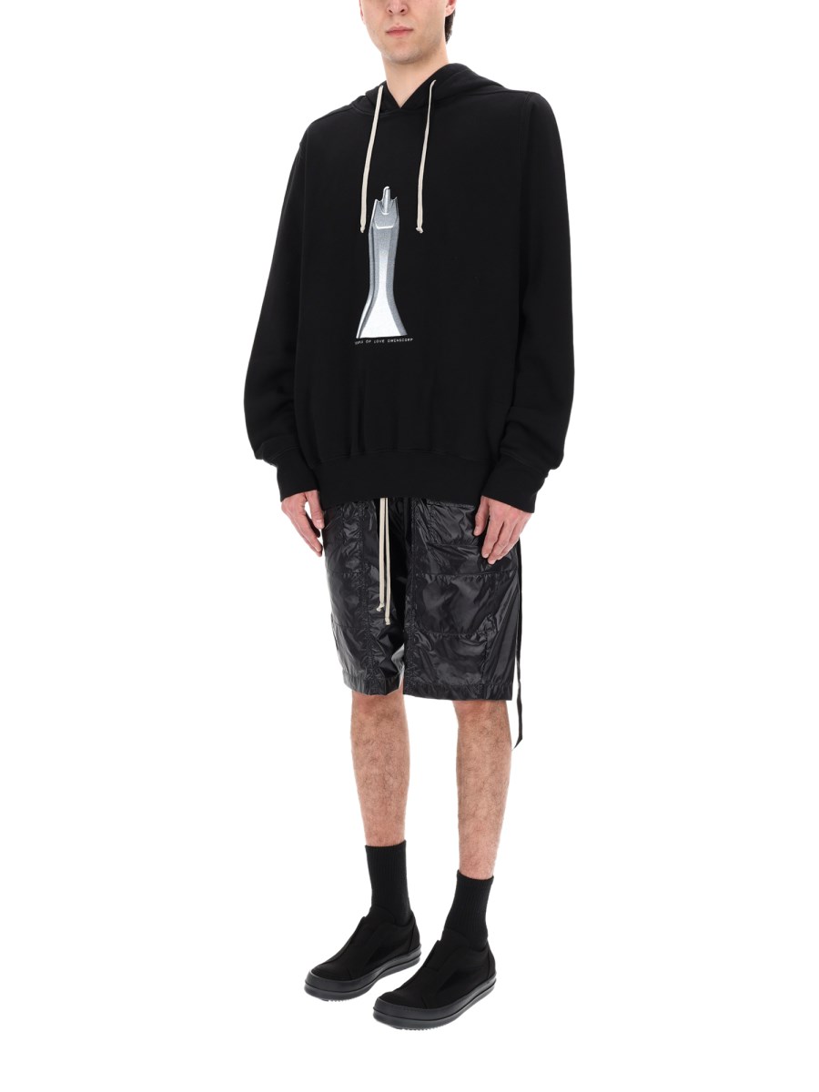 FELPA CON CAPPUCCIO OVERSIZE