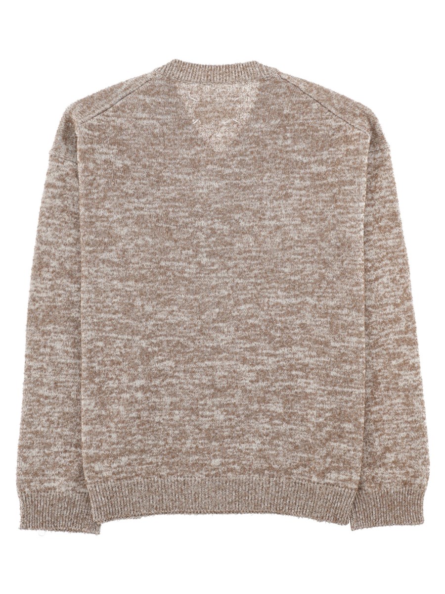 MAGLIA CON SCOLLO A V