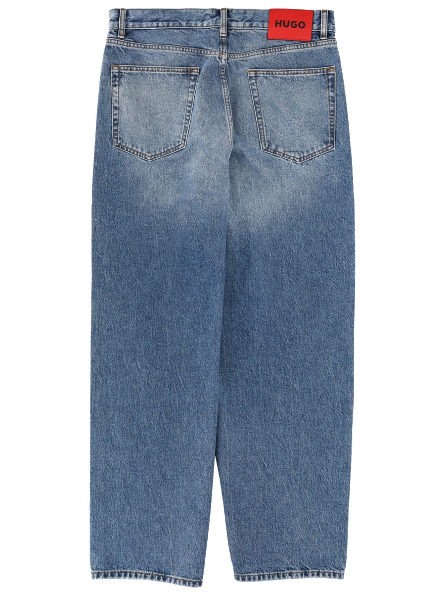 JEANS CON PATCH LOGO