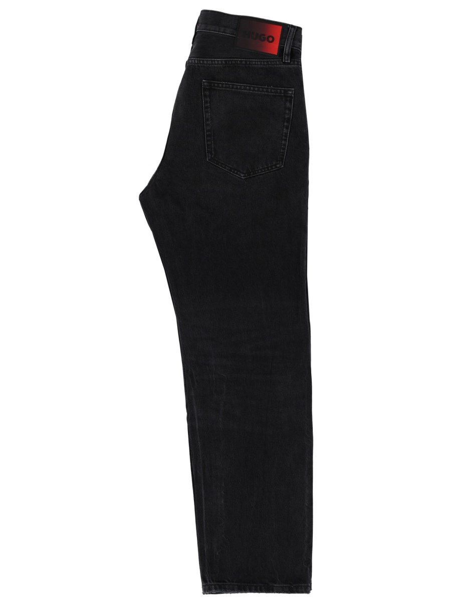 JEANS CON PATCH LOGO