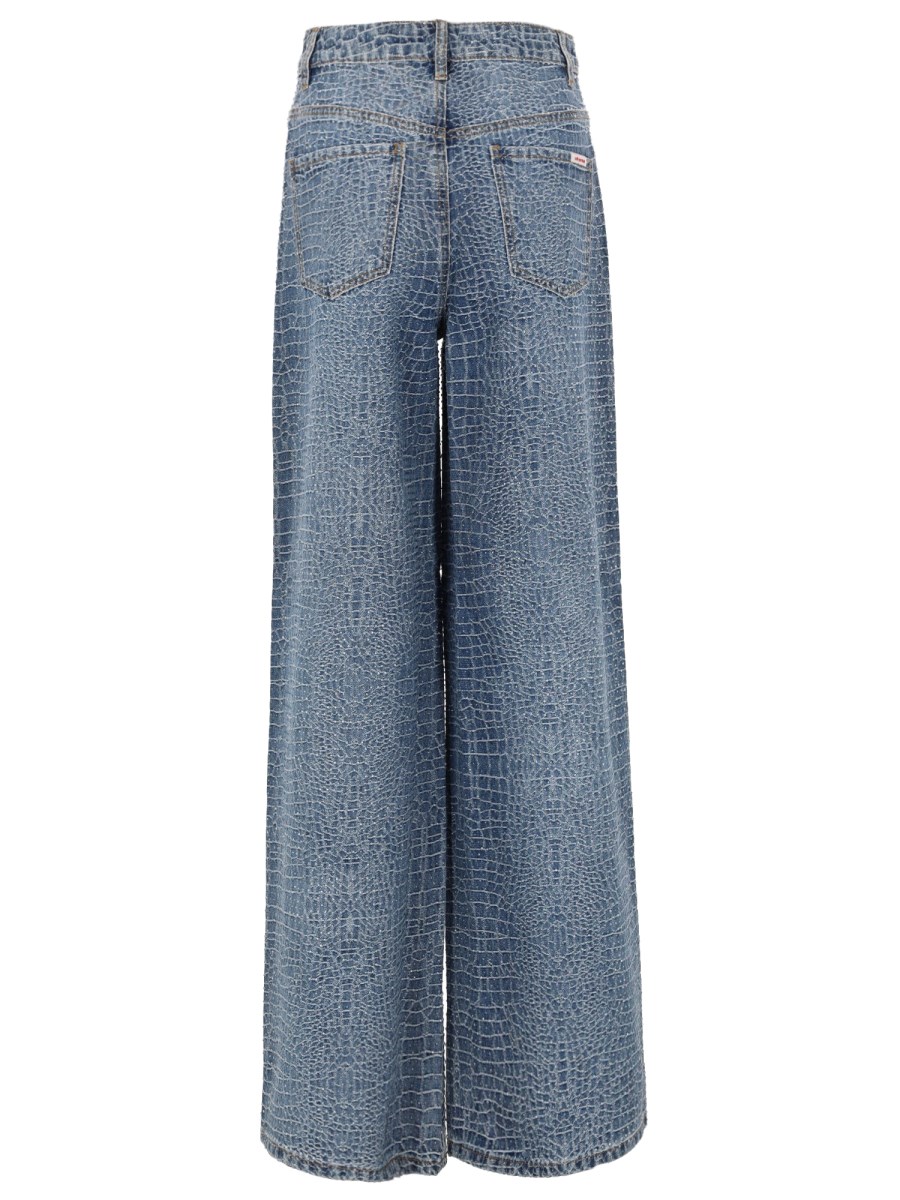JEANS CON STRASS EFFETTO COCCODRILLO