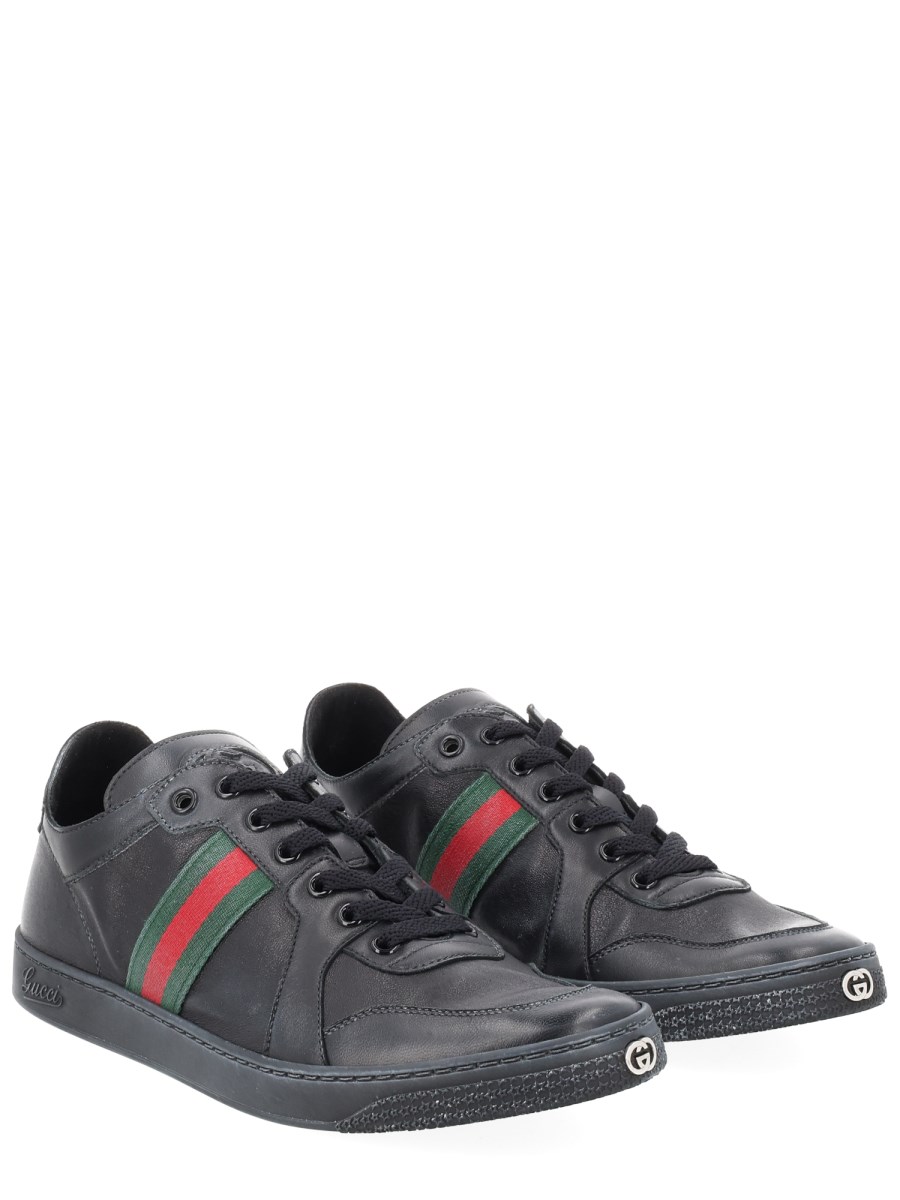 SNEAKER IN PELLE EFFETTO STRETCH