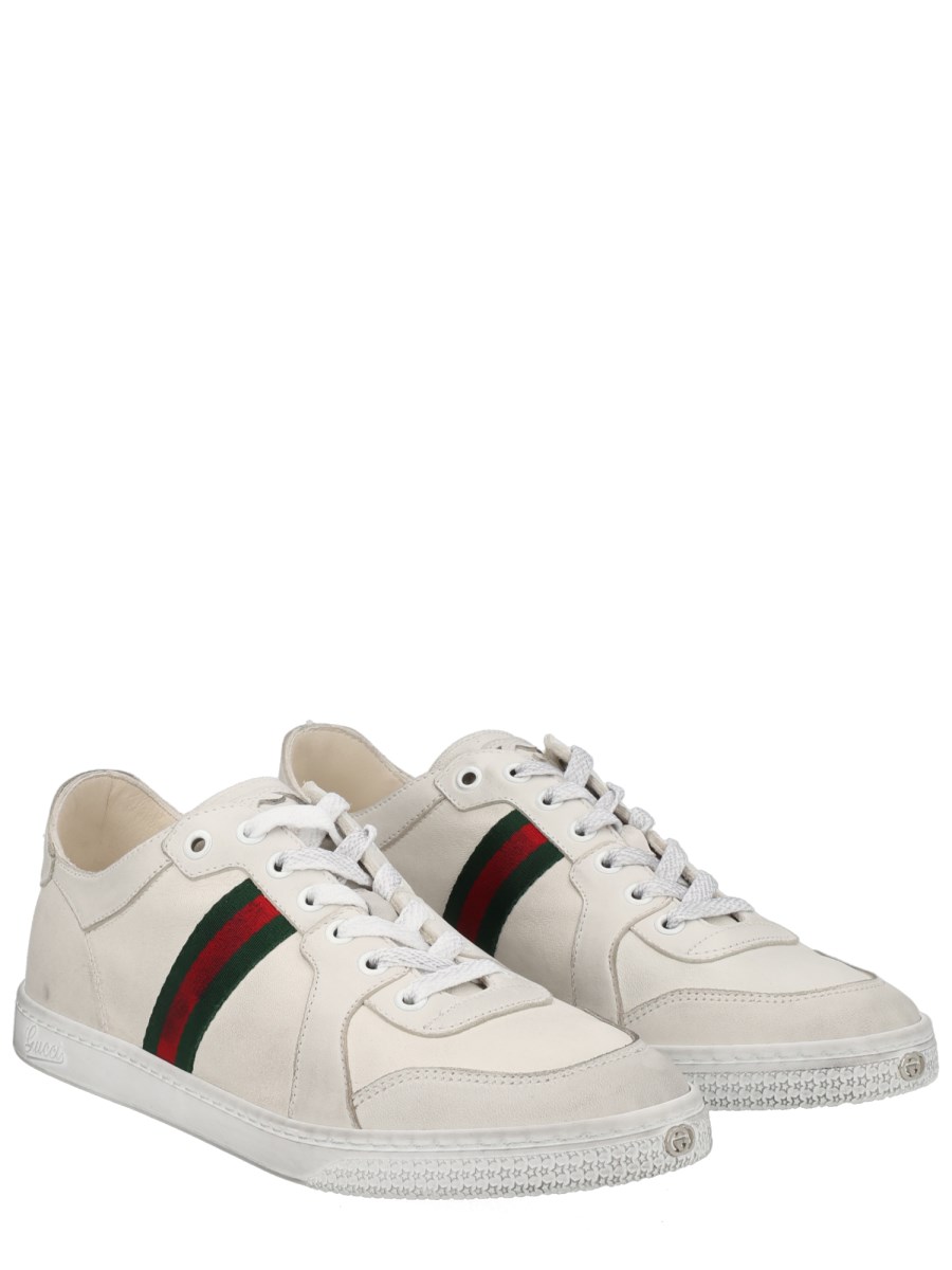 SNEAKER IN PELLE EFFETTO STRETCH