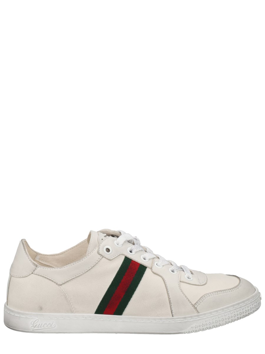 SNEAKER IN PELLE EFFETTO STRETCH