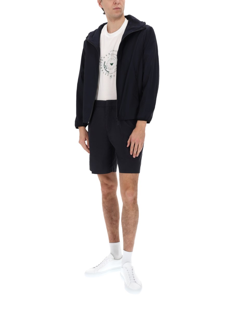 GIACCA CON ZIP E CAPPUCCIO