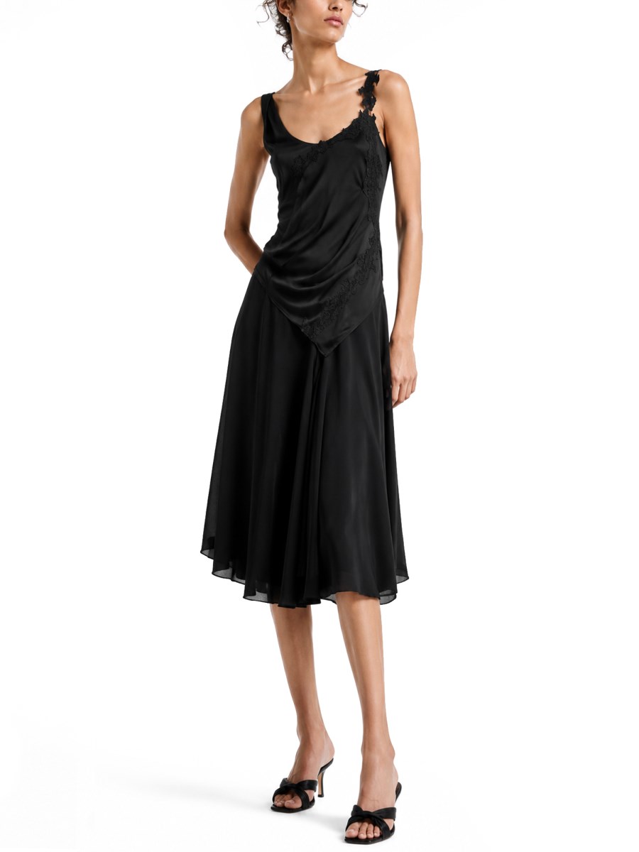ABITO CON INSERTI IN PIZZO