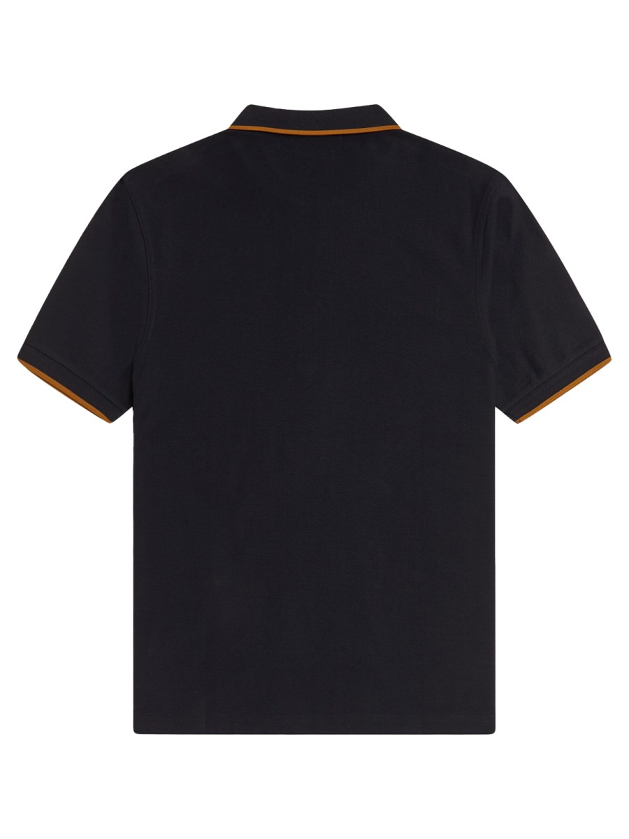 POLO CON ZIP E LOGO