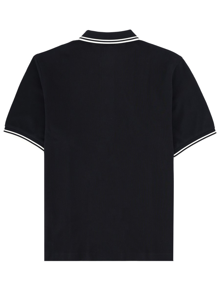 POLO CON BOTTONI E LOGO