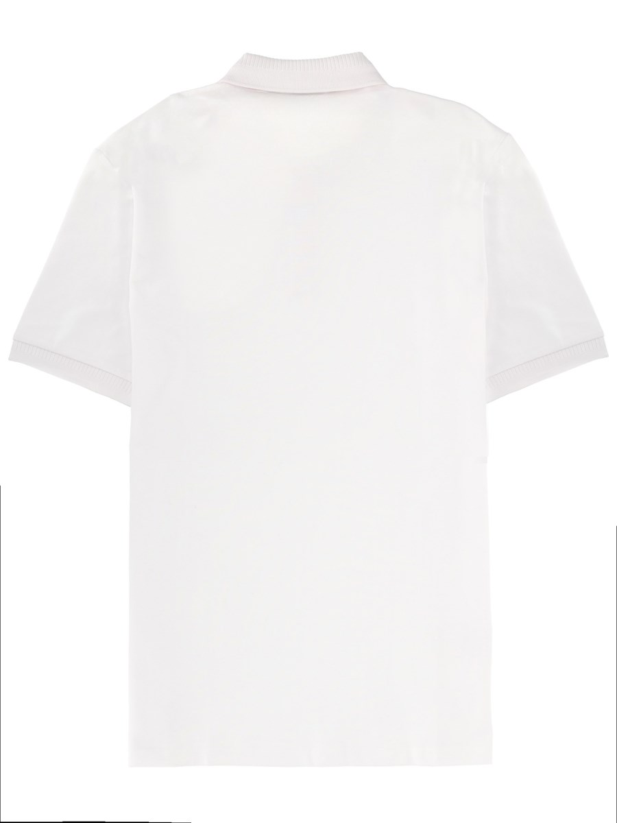 POLO CON PATCH LOGO