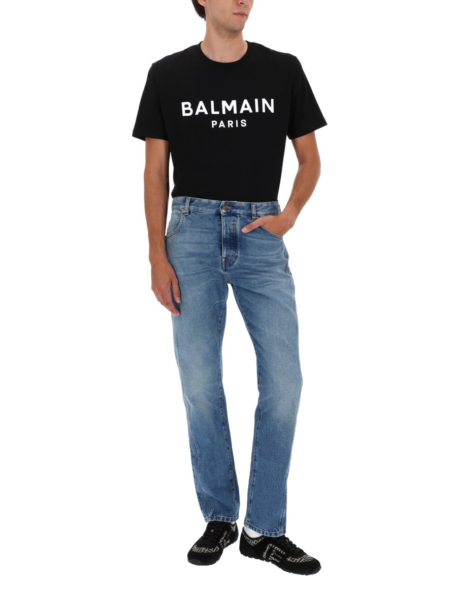 JEANS DRITTO IN DENIM DÉLAVÉ