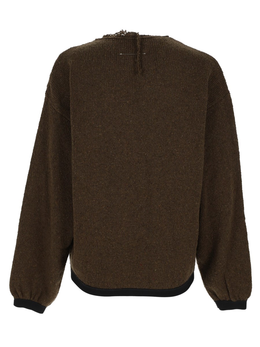 maglia con dettagli sfrangiati